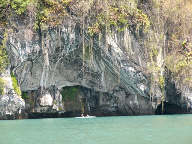 C-S kayak past caves